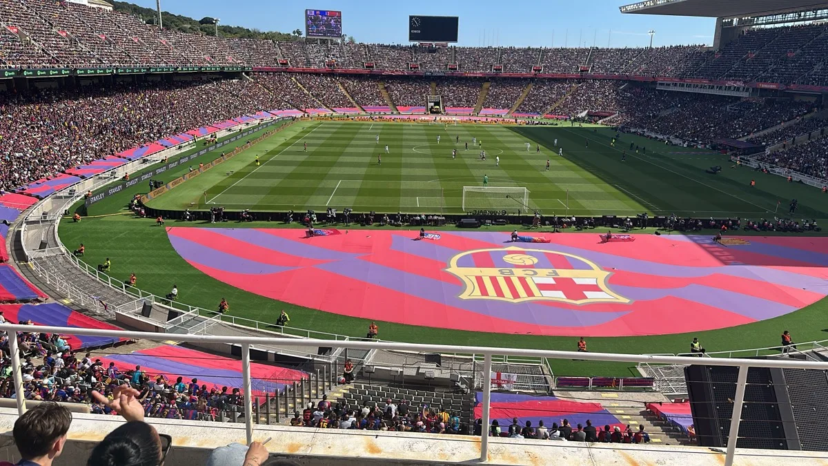 View from the stands of a packed FC Barcelona match at the Olympic stadium in Barcelona