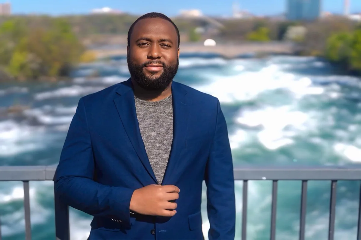 Portrait of Jean-Luc Saint-Fleur in a blue blazer at Niagara Falls